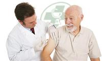 Pharmacist giving a flu shot