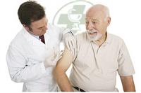 Pharmacist giving patient the flu shot